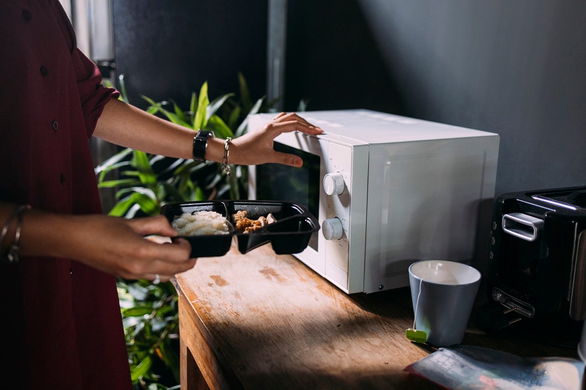 New research has found that microwaving plastic food containers spews out toxic microplastics — and it's freaked out the guy studying it.