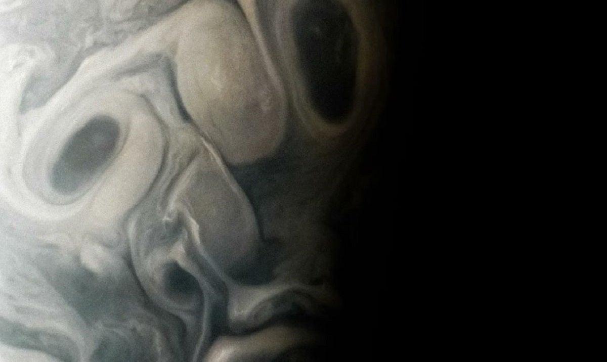 Even the ghouls on Jupiter are out for Halloween! The Juno spacescraft captured a spooky image of a grimacing "face" in Jupiter's clouds.
