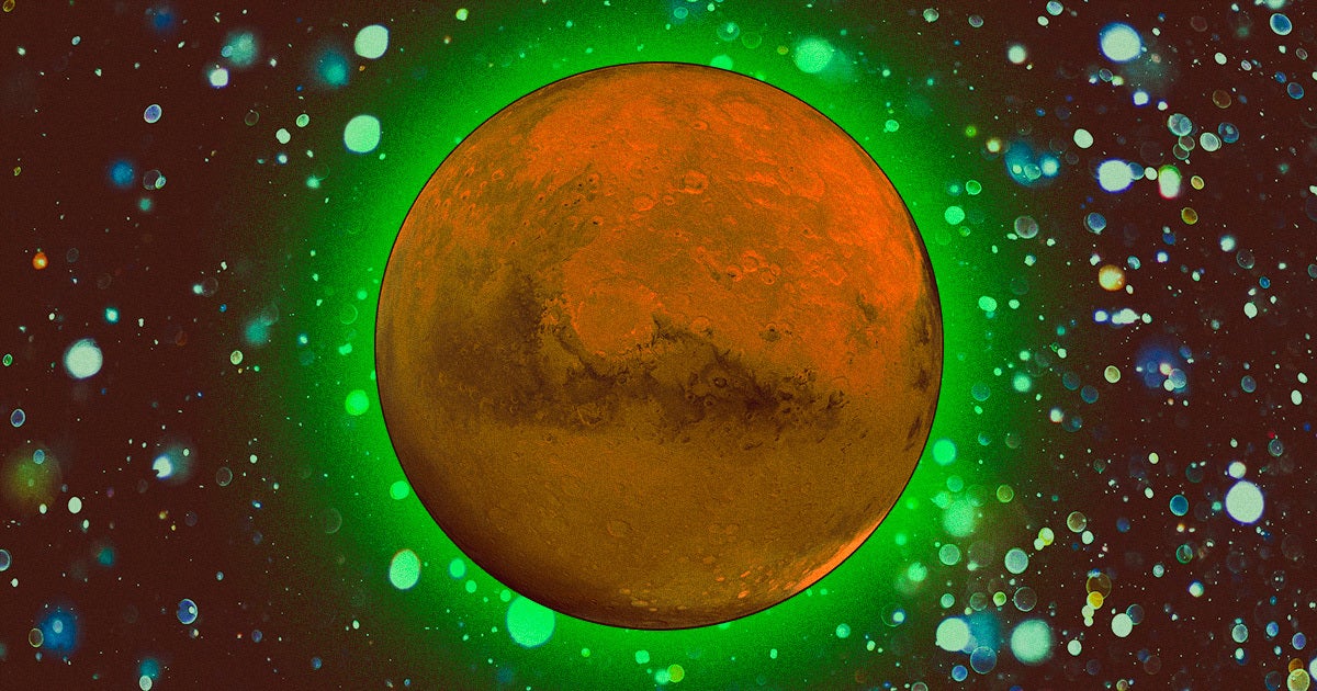 During a recent probe, the European Space Agency's ExoMars probe spotted the Red Planet glowing green at night.
