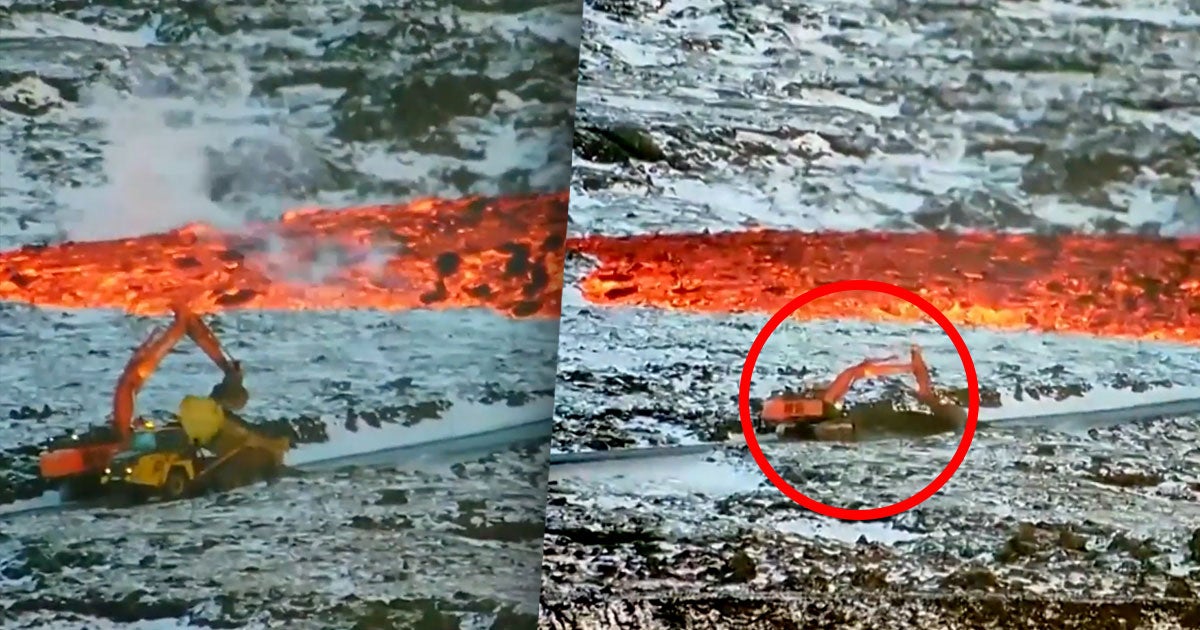 A widely-circulating video shows a worker inside a backhoe in Iceland spreading dirt to stop quickly approaching lava from destroying a road.