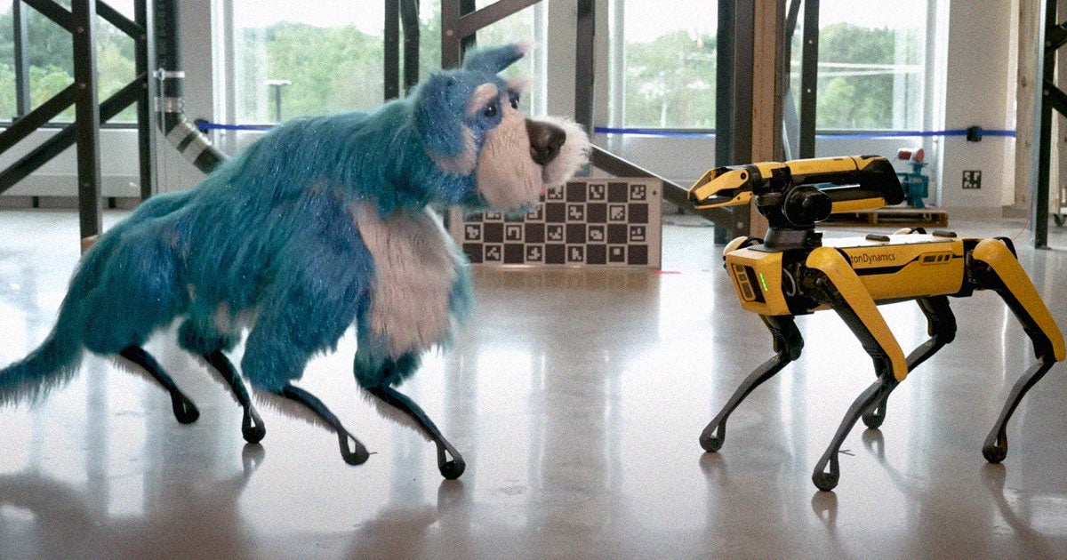 Robotics company Boston Dynamics has released a video of its Spot Mini robot dog dressed up in a bedazzled suit of fur.