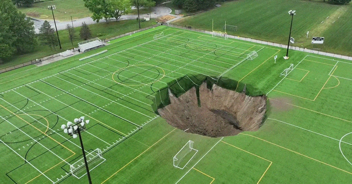 An almost perfectly round, 100-foot sinkhole opened up in an Illinois park this week, a terrifying incident that was caught on camera.