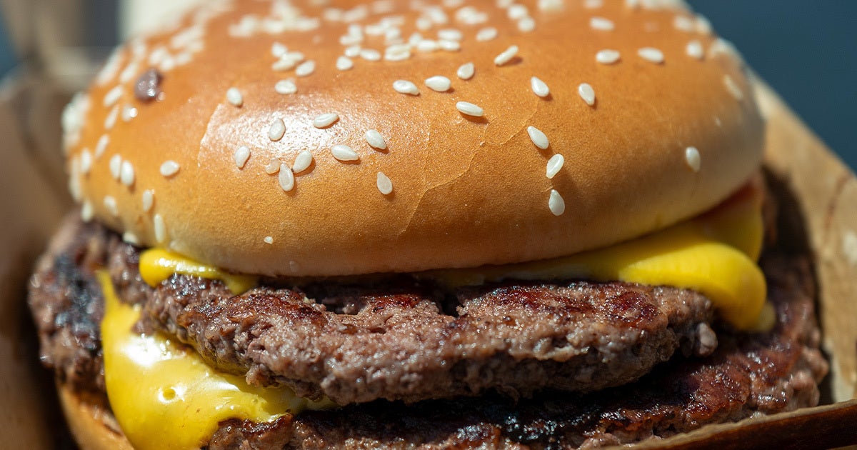 An outbreak of E. coli has been linked to McDonald's Quarter Pounder hamburgers, which has left at least one dead and ten hospitalized.